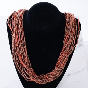 24 inch Multistrand Coral colored beads necklace